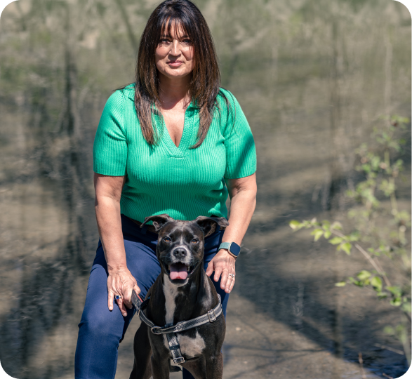 Dog trainer Lisa Yasenchak with her dog, Ned, at New Era Dog Training.